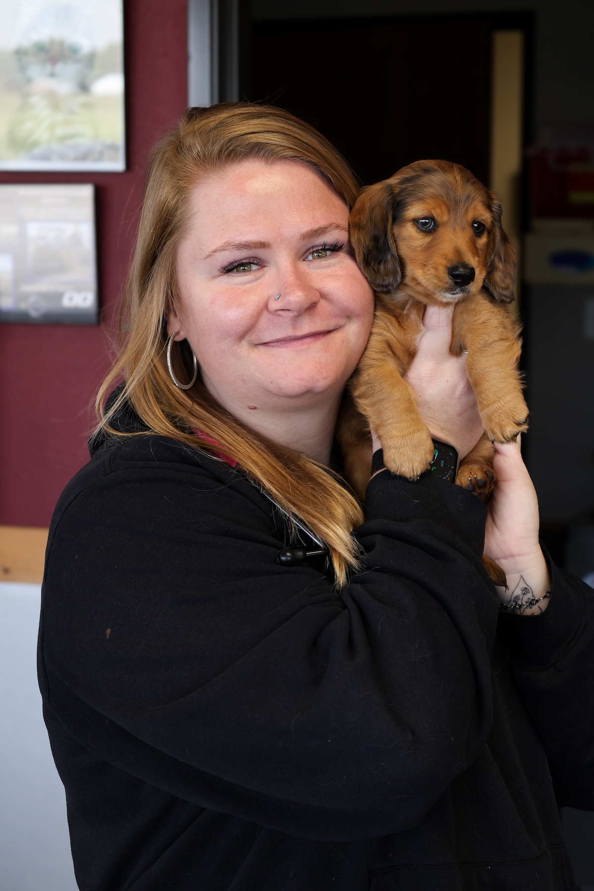 Team member and puppy